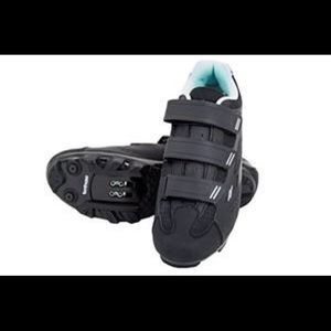 Black and teal spin shoes